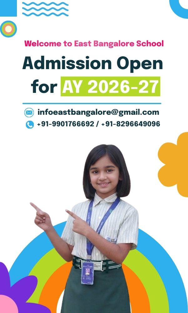 Happy children in a classroom at East Bangalore School